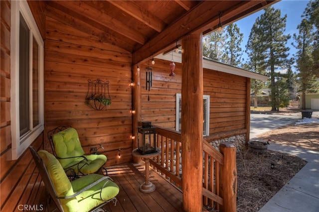 wooden terrace with covered porch