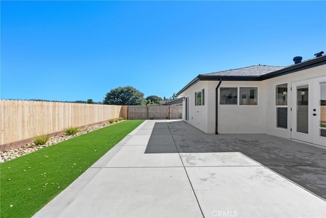 view of patio featuring a fenced backyard