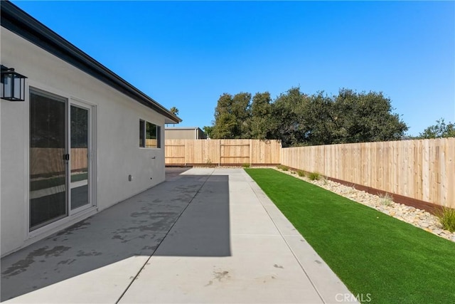 view of patio with a fenced backyard