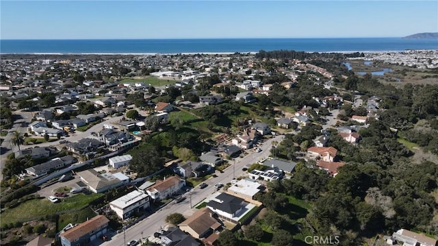 bird's eye view featuring a residential view and a water view