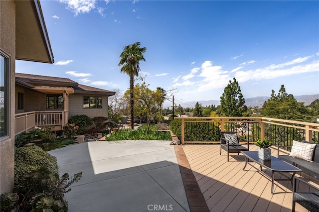 wooden terrace with a mountain view