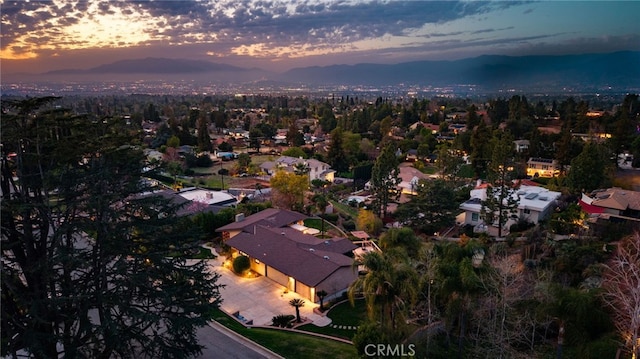 aerial view at dusk with a residential view