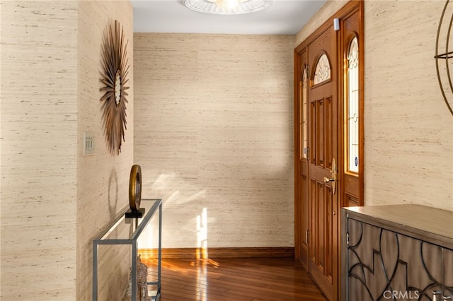 corridor with baseboards and dark wood-type flooring