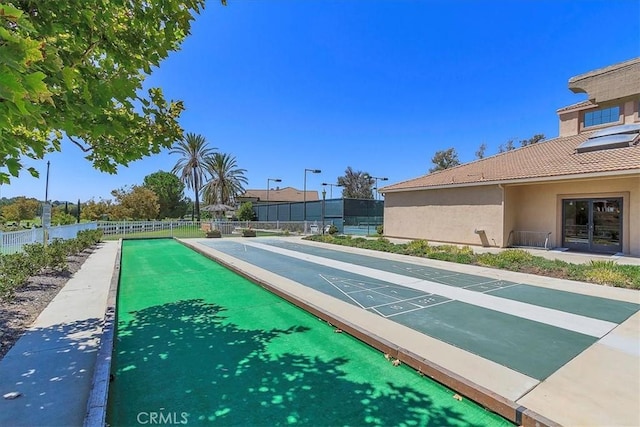 40292 Corte Delfin, Murrieta, CA 92562 - view of property's community with shuffleboard and fence