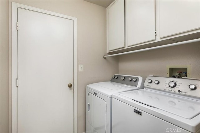 40292 Corte Delfin, Murrieta, CA 92562 - laundry room with washing machine and clothes dryer and cabinet space