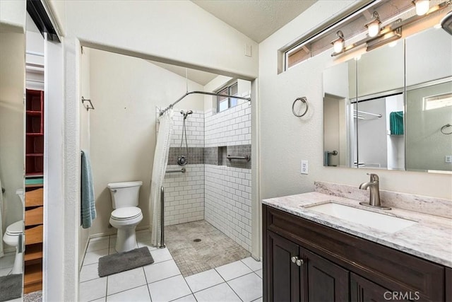 40292 Corte Delfin, Murrieta, CA 92562 - full bathroom with vanity, a tile shower, tile patterned floors, and lofted ceiling