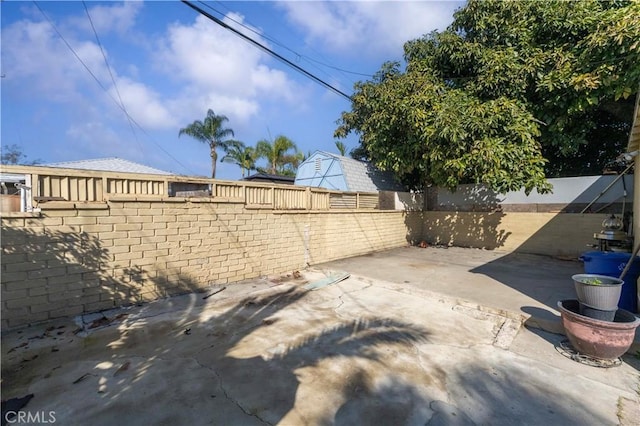 view of patio with a fenced backyard