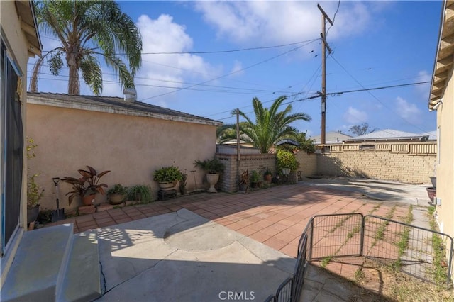 view of patio featuring a fenced backyard