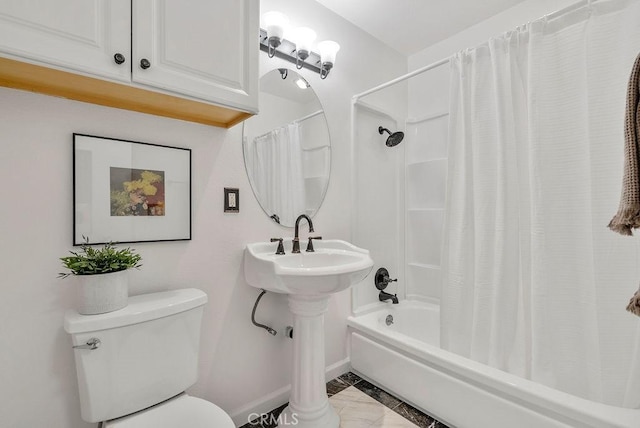 bathroom featuring shower / bath combination with curtain, toilet, and baseboards