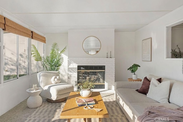 carpeted living area featuring a fireplace and a wealth of natural light