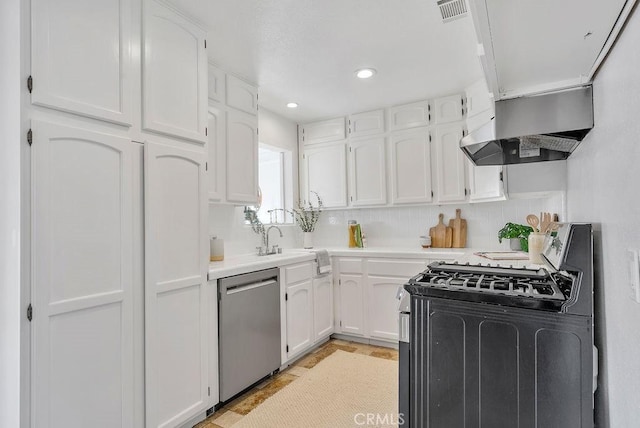 kitchen with exhaust hood, white cabinets, light countertops, dishwasher, and gas range