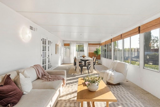 sunroom with french doors and visible vents