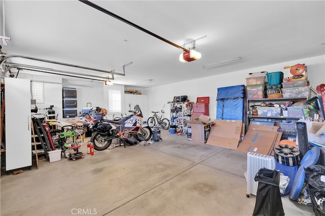 garage featuring a garage door opener