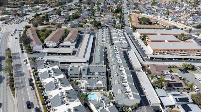 birds eye view of property with a residential view