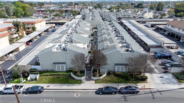 birds eye view of property with a residential view