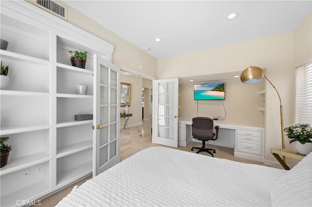 bedroom with recessed lighting, french doors, visible vents, and built in desk