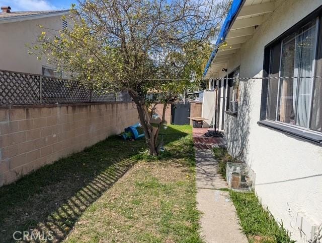 view of yard with a fenced backyard