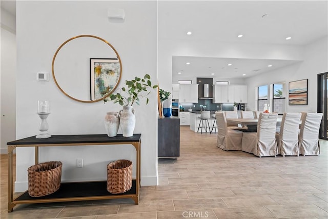 interior space featuring wood finish floors and recessed lighting