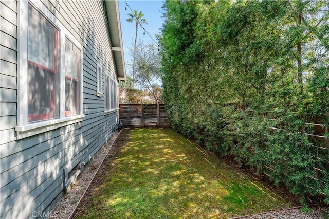 view of yard featuring a fenced backyard