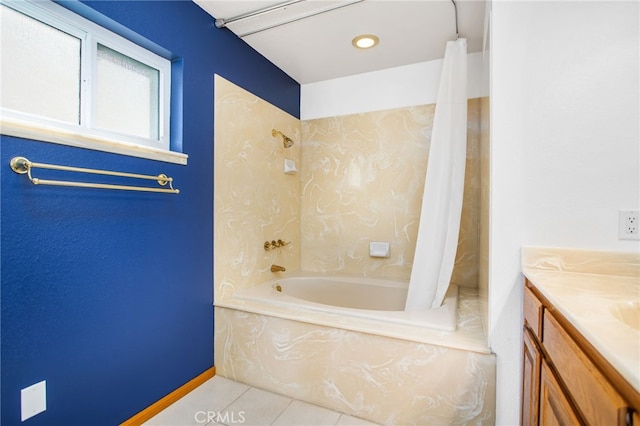 full bathroom featuring tile patterned flooring, vanity, and a combined bath / shower with marble appearance