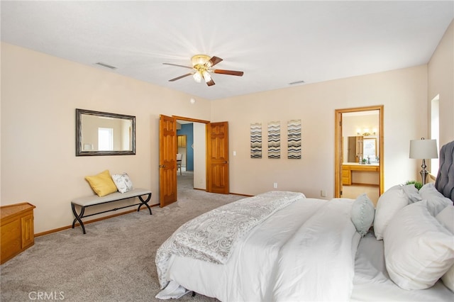 bedroom with baseboards, ceiling fan, visible vents, and light colored carpet