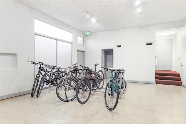 garage with bike storage and baseboards