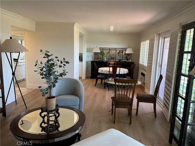 4018 Calle Sonora Este Unit C, Laguna Woods, CA 92637 - dining area with light wood finished floors, ornamental molding, and baseboards