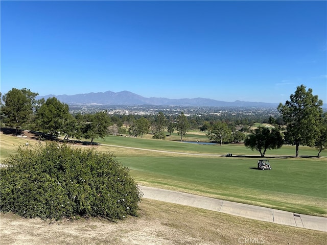 4018 Calle Sonora Este Unit C, Laguna Woods, CA 92637 - view of community featuring view of golf course, a mountain view, and a yard