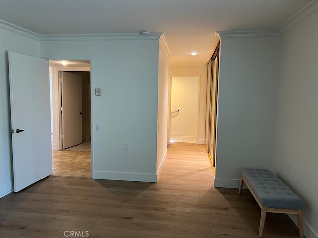 4018 Calle Sonora Este Unit C, Laguna Woods, CA 92637 - corridor featuring ornamental molding, light wood-type flooring, and baseboards