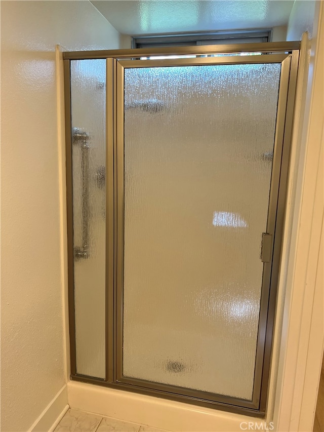4018 Calle Sonora Este Unit C, Laguna Woods, CA 92637 - full bath featuring a stall shower and marble look tile flooring