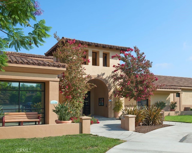 4018 Calle Sonora Este Unit C, Laguna Woods, CA 92637 - mediterranean / spanish-style home featuring stucco siding