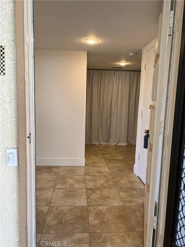 4018 Calle Sonora Este Unit C, Laguna Woods, CA 92637 - hall with baseboards and tile patterned floors