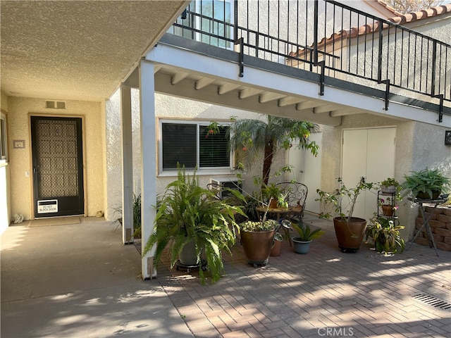 4018 Calle Sonora Este Unit C, Laguna Woods, CA 92637 - view of patio / terrace with a balcony