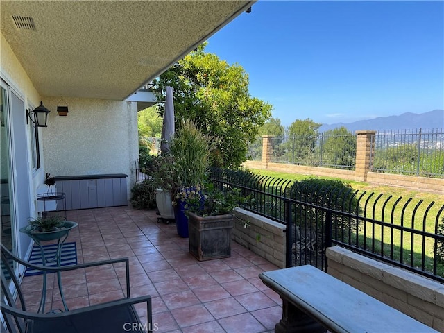 4018 Calle Sonora Este Unit C, Laguna Woods, CA 92637 - view of patio / terrace featuring a mountain view
