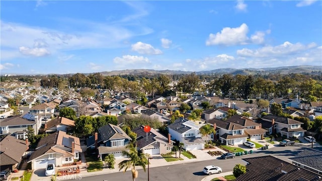 bird's eye view featuring a residential view and a mountain view