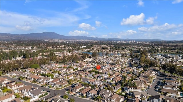 bird's eye view featuring a mountain view and a residential view