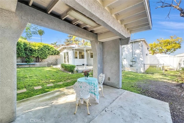 view of patio with a fenced backyard and a gate