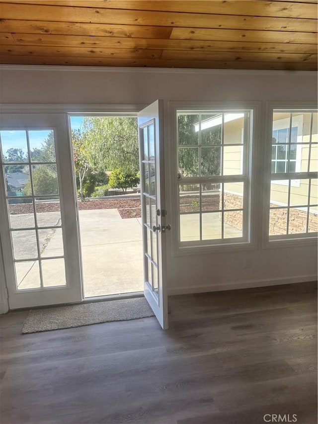 entryway featuring plenty of natural light, wood ceiling, and dark wood finished floors