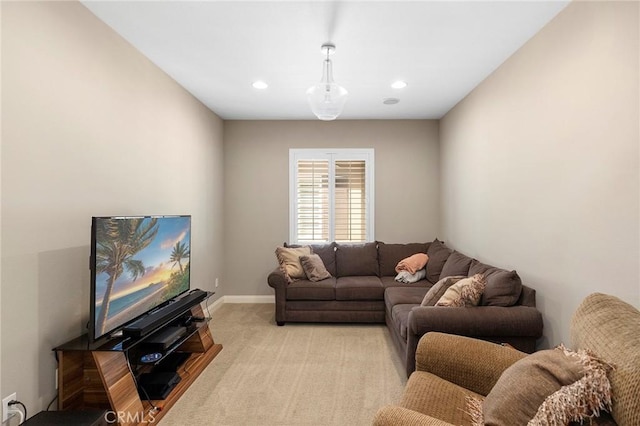 living room featuring light carpet, recessed lighting, and baseboards