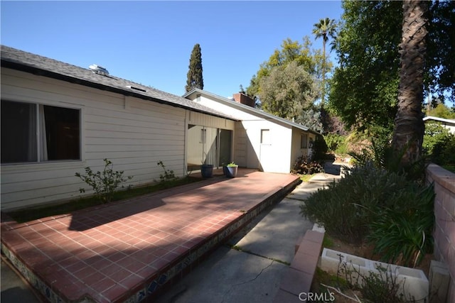 rear view of property with a patio