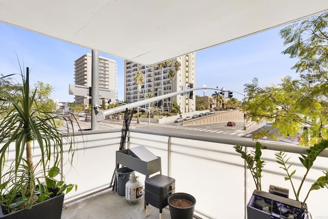 balcony featuring a view of city