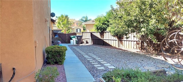 view of yard featuring a patio area and fence