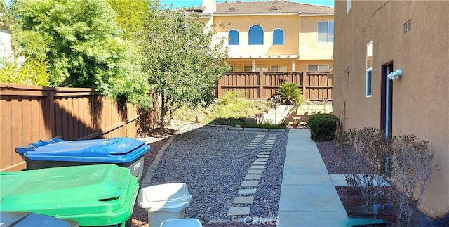 view of yard featuring a fenced backyard