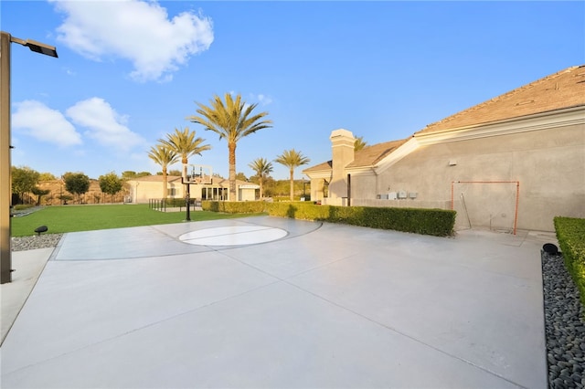 view of patio with basketball court