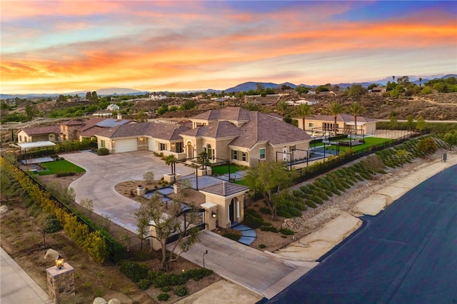 aerial view at dusk with a residential view