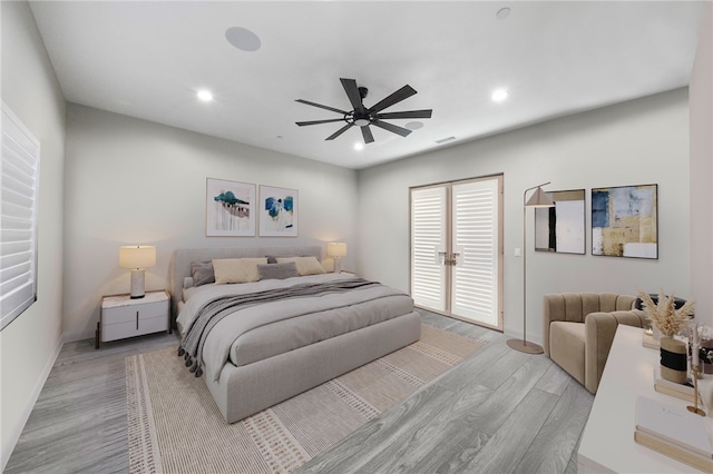 bedroom featuring recessed lighting, baseboards, ceiling fan, and light wood finished floors