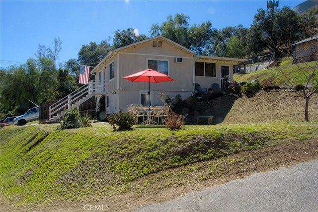 view of front of home with stairway