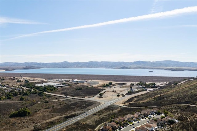 bird's eye view with a water and mountain view