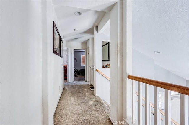 corridor with light carpet