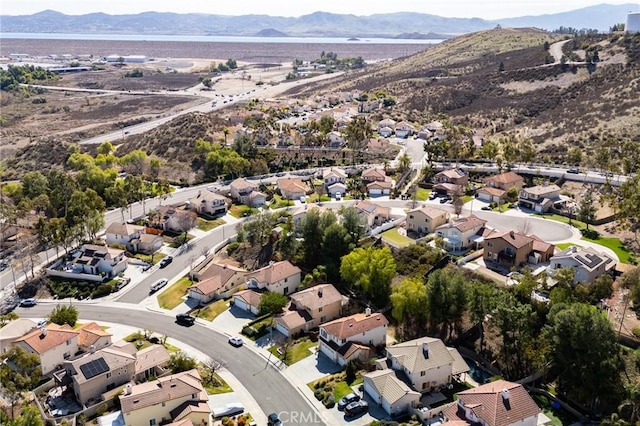 bird's eye view with a residential view and a mountain view